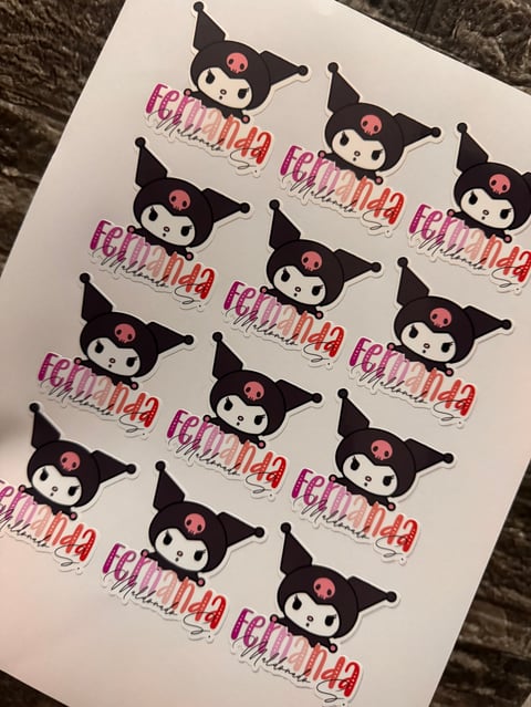 Repeating pattern of black Badtz-Maru penguin characters with pink text on white paper